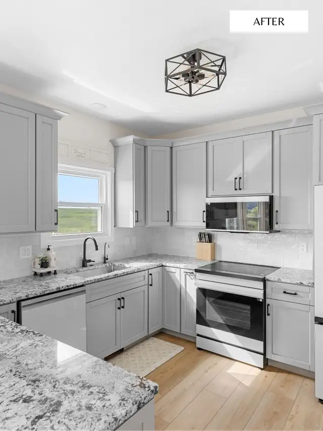 Light gray kitchen cabinets with white granite counters and hexagon ceiling light